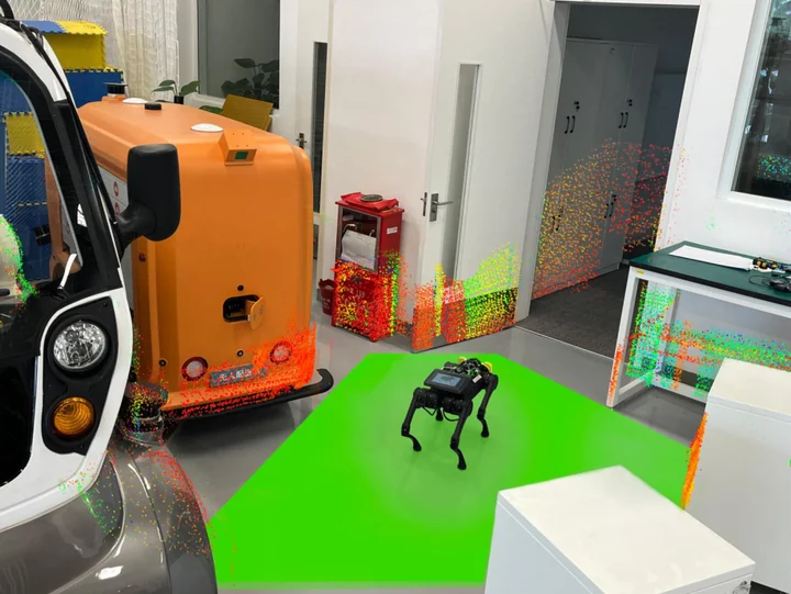 A quadruped robot navigates a cluttered laboratory within a green locally safe region.